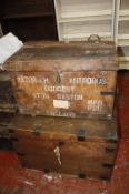 A leather travelling trunk, two wooden "silver" trunks and three black metal trunks. Best Bid
