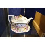 A Spode teapot and stand circa 1820, rose and gilt decorated