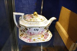 A Spode teapot and stand circa 1820, rose and gilt decorated