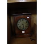 An early 20th Century British mahogany mantel clock, boxwood stringing, Arabic numeral dial with '