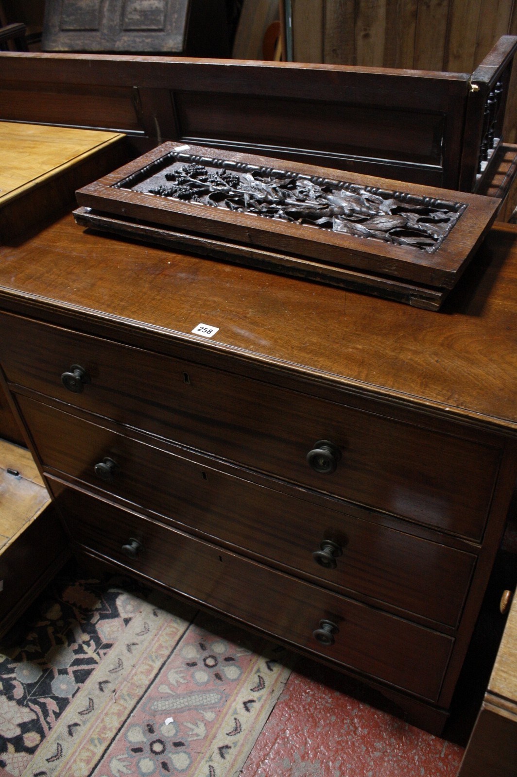 A 19th Century mahogany chest of three long drawers 84cm high, 92cm wide Best Bid