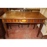 A 19th century mahogany side table with inlaid frieze. 129cm wide x 63cn deep x 85cm high.