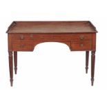 A George IV mahogany dressing table or desk, circa 1825, in the manner of Gillows of Lancaster,