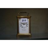 A French gilt brass carriage clock, the enamel face dial marked W. Bruford & Sons, 14.5cm high (
