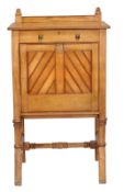 An Aesthetic ash secretaire, circa 1870, the top with moulded edge above single frieze drawer and