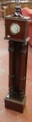 A William IV style mahogany clock long case floor standing clock with twin fluted columns supporting