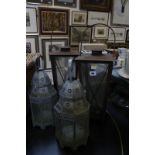 Two pairs of metal lanterns, together with a F & M picnic hamper basket Best Bid