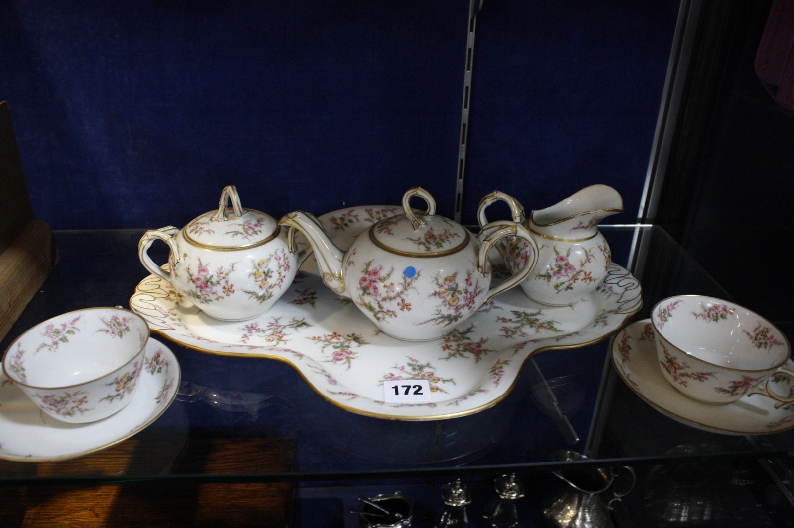 A porcelain tête-à-tête tea service, floral painted Best Bid