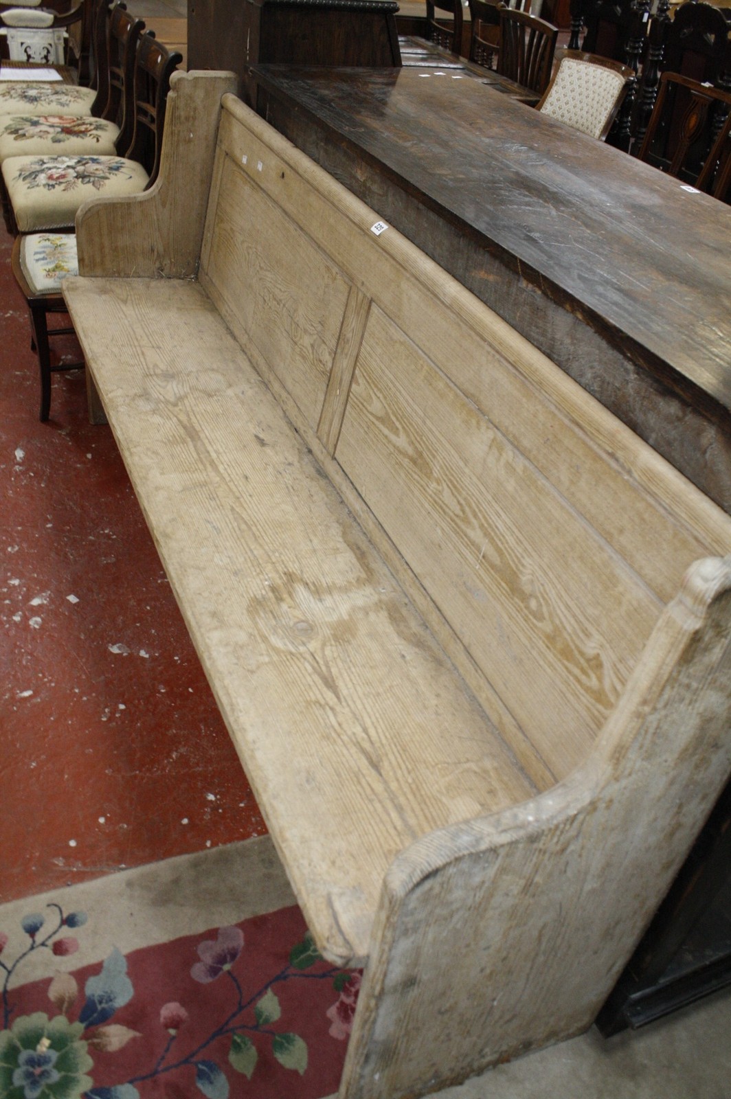A pine pew/hall bench. 190cm long.