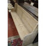 A pine pew/hall bench. 190cm long.