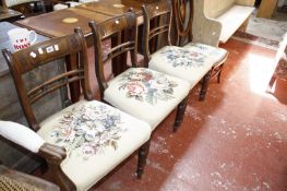 Three 19th century dining chairs with needle point seats and an Edwardian side chair with