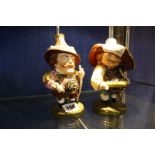 A pair of Royal Crown Derby models of Mansion House dwarfs, 17cm and 18cm high -2