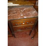 A French marble topped bedside cabinet on fluted legs