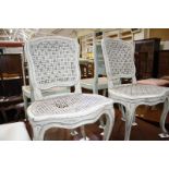 A pair of 18th Century painted salon chairs, together with a pair of painted side chairs