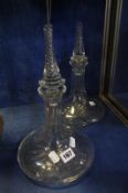 Two glass ships decanters, with spiral twisted stoppers, 32cm high Best Bid