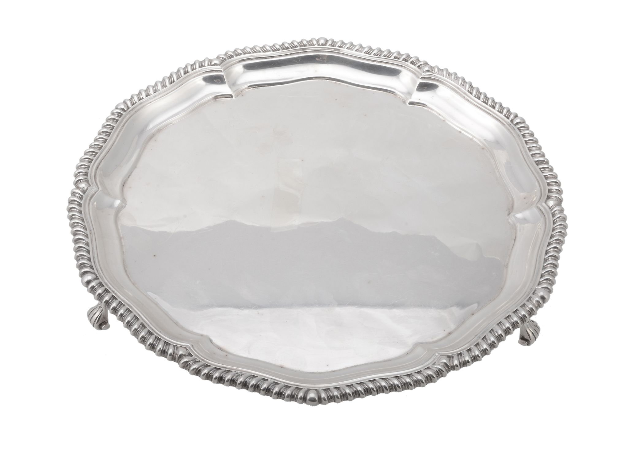A silver shaped circular salver by Elkington & Co  A silver shaped circular salver by