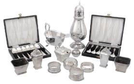 A collection of silver items, to include: a six piece facetted tapering...  A collection of silver