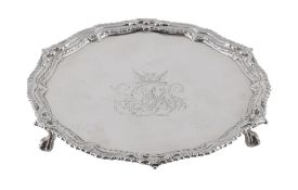 A George III silver shaped circular salver by Ebenezer Coker, London 1771  A George III silver