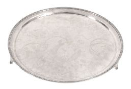 A silver circular salver by Elkington & Co  A silver circular salver by Elkington  &  Co.,