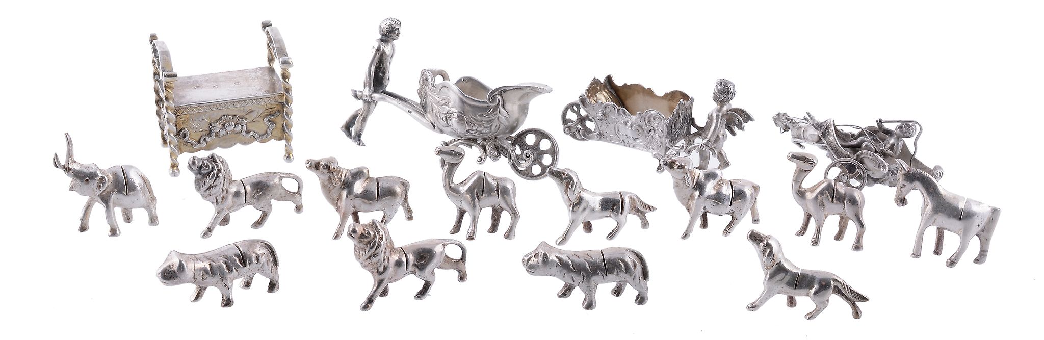 Four silver coloured figures, to include: a silver coloured figure of a...  Four silver coloured