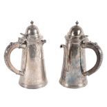 A matched pair of silver straight-tapered cafe au lait pots by Garrard & Co  A matched pair of