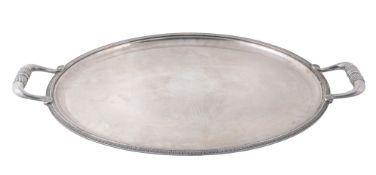 A French electroplated twin handled oval tray by Christofle, stamped marks  A French electroplated
