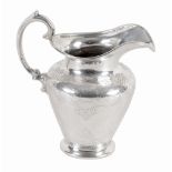 A Victorian Irish silver jug by James Fray, Dublin 1841, with a reeded border  A Victorian Irish