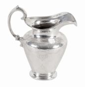 A Victorian Irish silver jug by James Fray, Dublin 1841, with a reeded border  A Victorian Irish