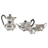 A matched silver oblong baluster four piece tea service, Chester 1907 and 1911  A matched silver