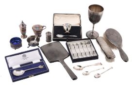 A collection of silver items, to include: a Victorian silver pedestal cup by...  A collection of