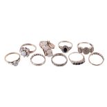 A collection of various rings , to include a four stone opal crossover dress ring, finger size P; a