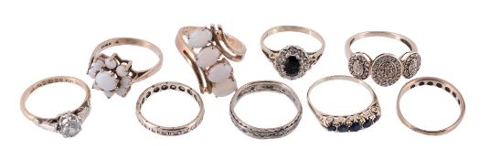 A collection of various rings , to include a four stone opal crossover dress ring, finger size P; a