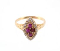 A ruby and diamond cluster ring, the marquise shaped panel set with a central cluster of calibre