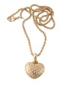 A diamond set heart pendant, the engraved heart set with brilliant cut diamonds, on a fancy link