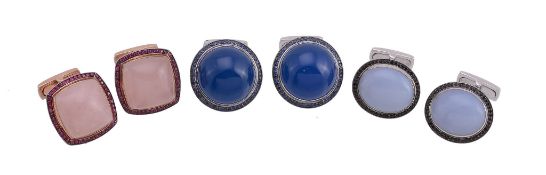 A pair of blue agate cufflinks, set with an oval shaped cabochon blue agate, with t bar fittings,