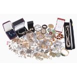 A collection of costume jewellery, including a late Victorian silver coloured brooch with a central