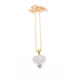 A diamond heart pendant, the heart shaped pendant pavé set with brilliant cut diamonds, suspended