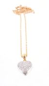 A diamond heart pendant, the heart shaped pendant pavé set with brilliant cut diamonds, suspended