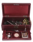 A collection of jewellery and other items in a burgundy leather case , to include an oval mourning