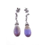 A pair of ametrine diamond drop earrings, the faceted ametrine drops suspended from an articulated