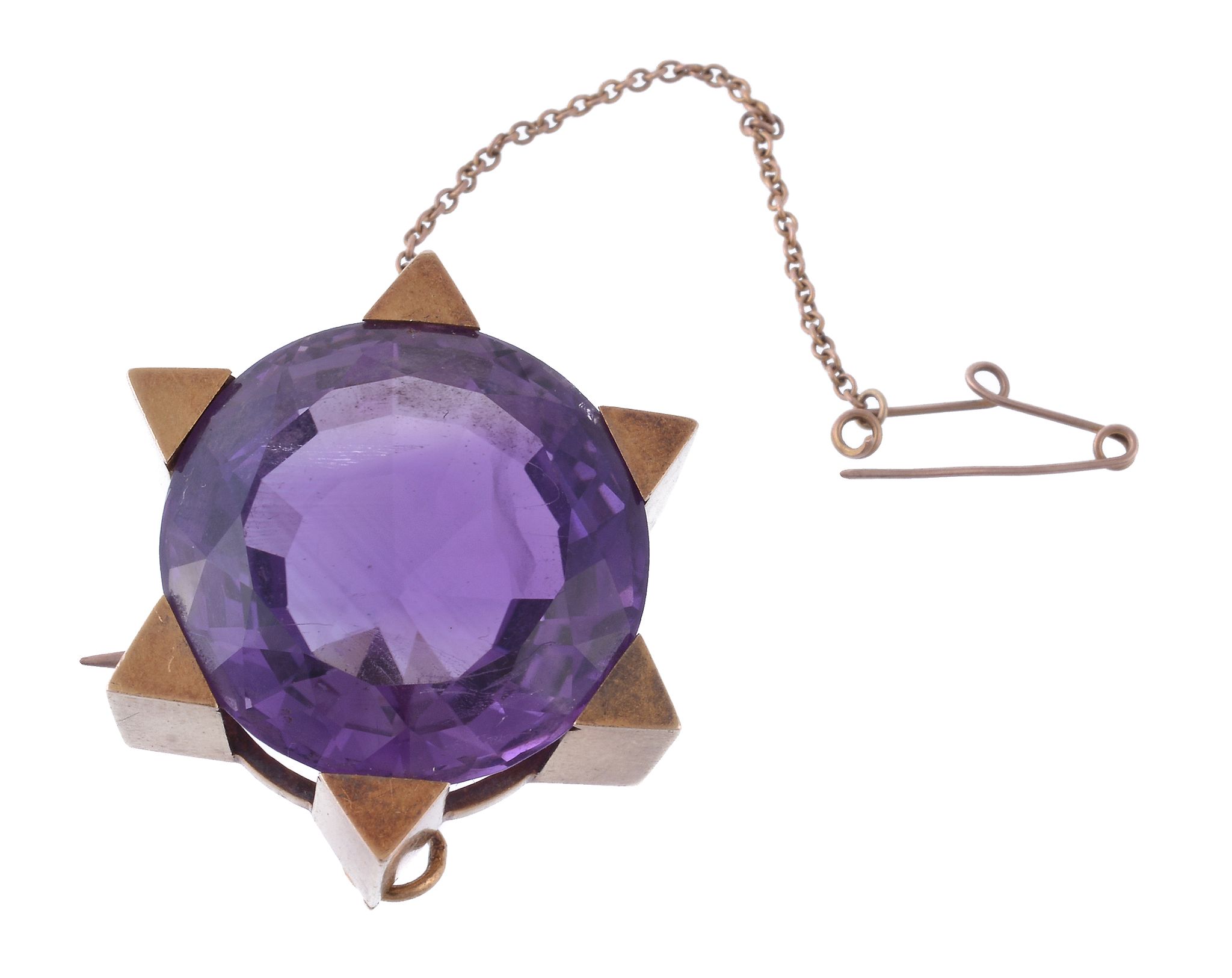 An amethyst brooch, the circular shaped amethyst within a six pointed star setting, 3.5cm diameter