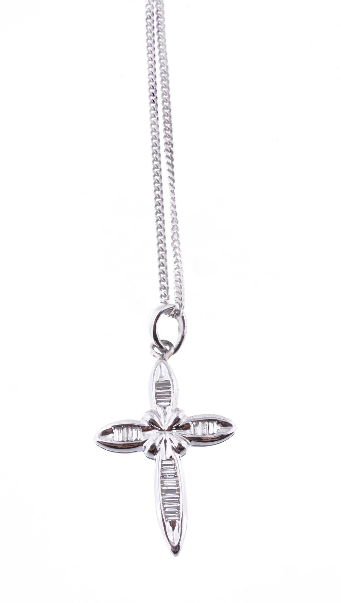 A diamond cross pendant, with baguette cut diamonds, approximately 0.39 carats total, stamped 750,