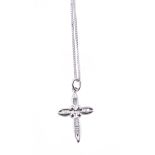 A diamond cross pendant, with baguette cut diamonds, approximately 0.39 carats total, stamped 750,