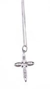 A diamond cross pendant, with baguette cut diamonds, approximately 0.39 carats total, stamped 750,