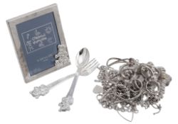 A collection of silver coloured jewellery and other jewellery items , including rings; bracelets;
