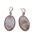 A pair of rutile quartz and diamond earrings, the oval shaped rutile quartz within a surround of