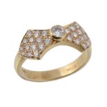 A diamond bow ring, the principal diamond in a raised collet setting above the pave set diamond bow