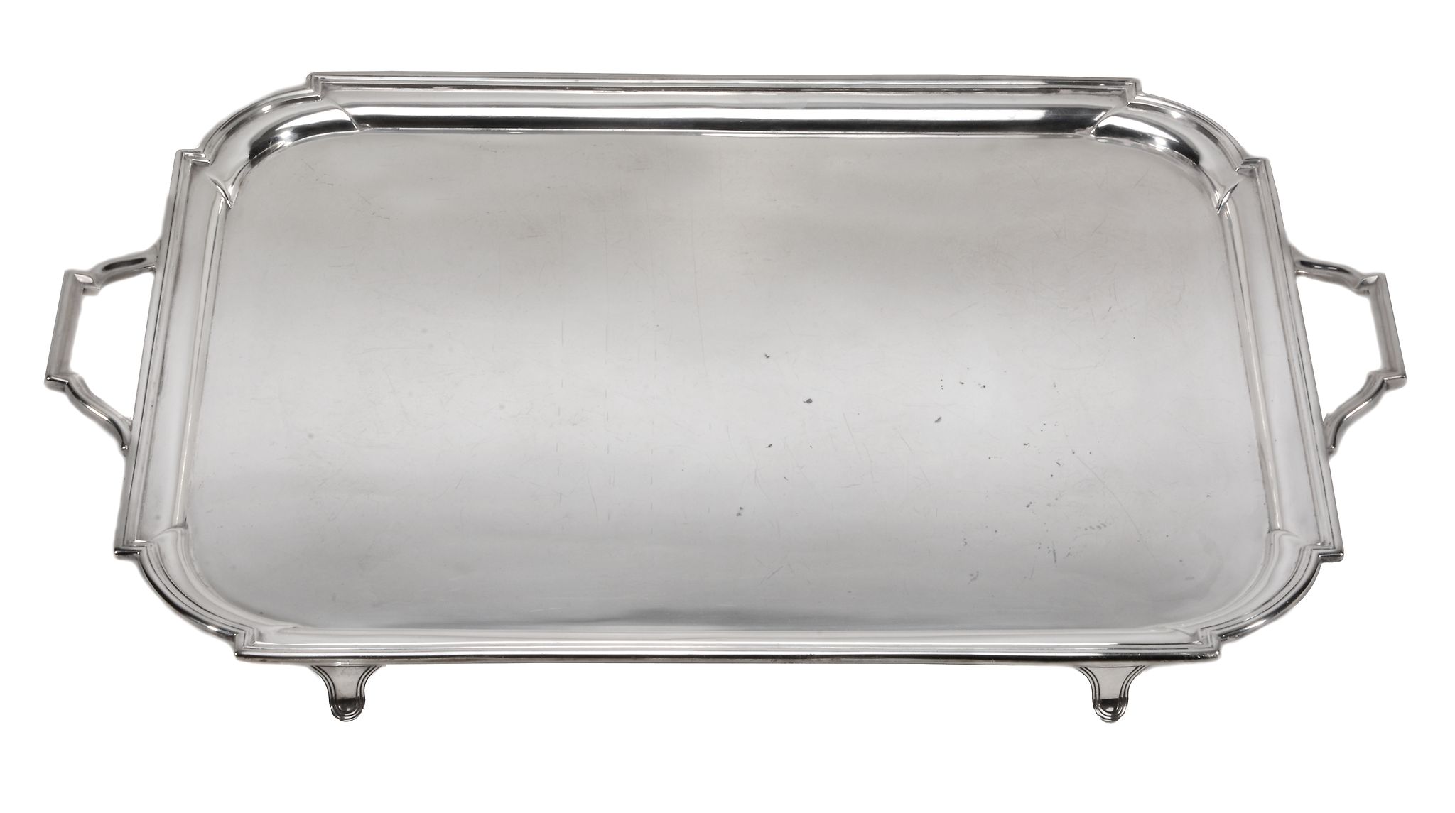 A silver twin handled tray by Mappin & Webb, Sheffield 1928, rectangular with inset curved angles,