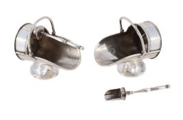 A pair of Victorian silver novelty salt cellars in the form of coal scuttles with scoops by Robert