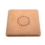 An Italian gold coloured ruby mounted square powder compact, 1944-68 Milan control mark, K18 and